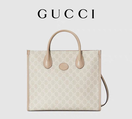 กระเป๋าสะพายผ้าใบ Gucci Supreme ขนาดเล็กพร้อม Interlocking G