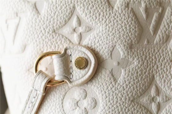 กระเป๋าถือสุภาพสตรียี่ห้อ Neverfull MM Monogram Empreinte ประดับมุกดอกไม้