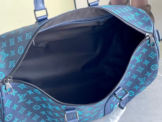 กระเป๋าบุรุษแบรนด์ใหญ่ Keepall BANDOULIÈRE 50 Blue Boston Bags
